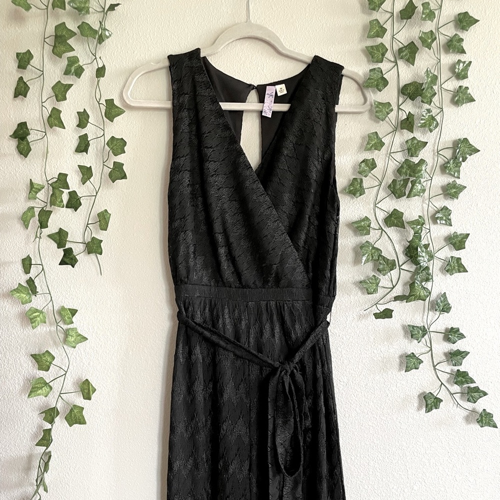 Black lace jump suit. Size Medium from brand Alya.